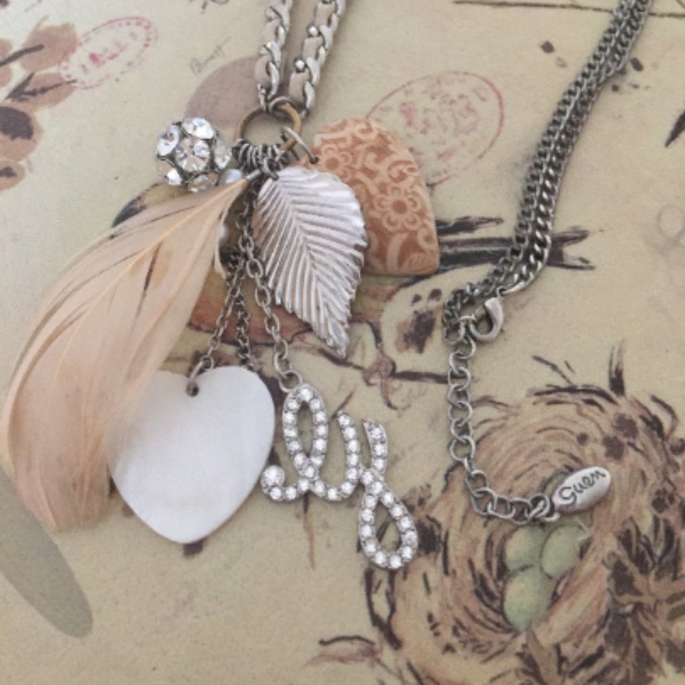 Vintage Necklace leather/feather.